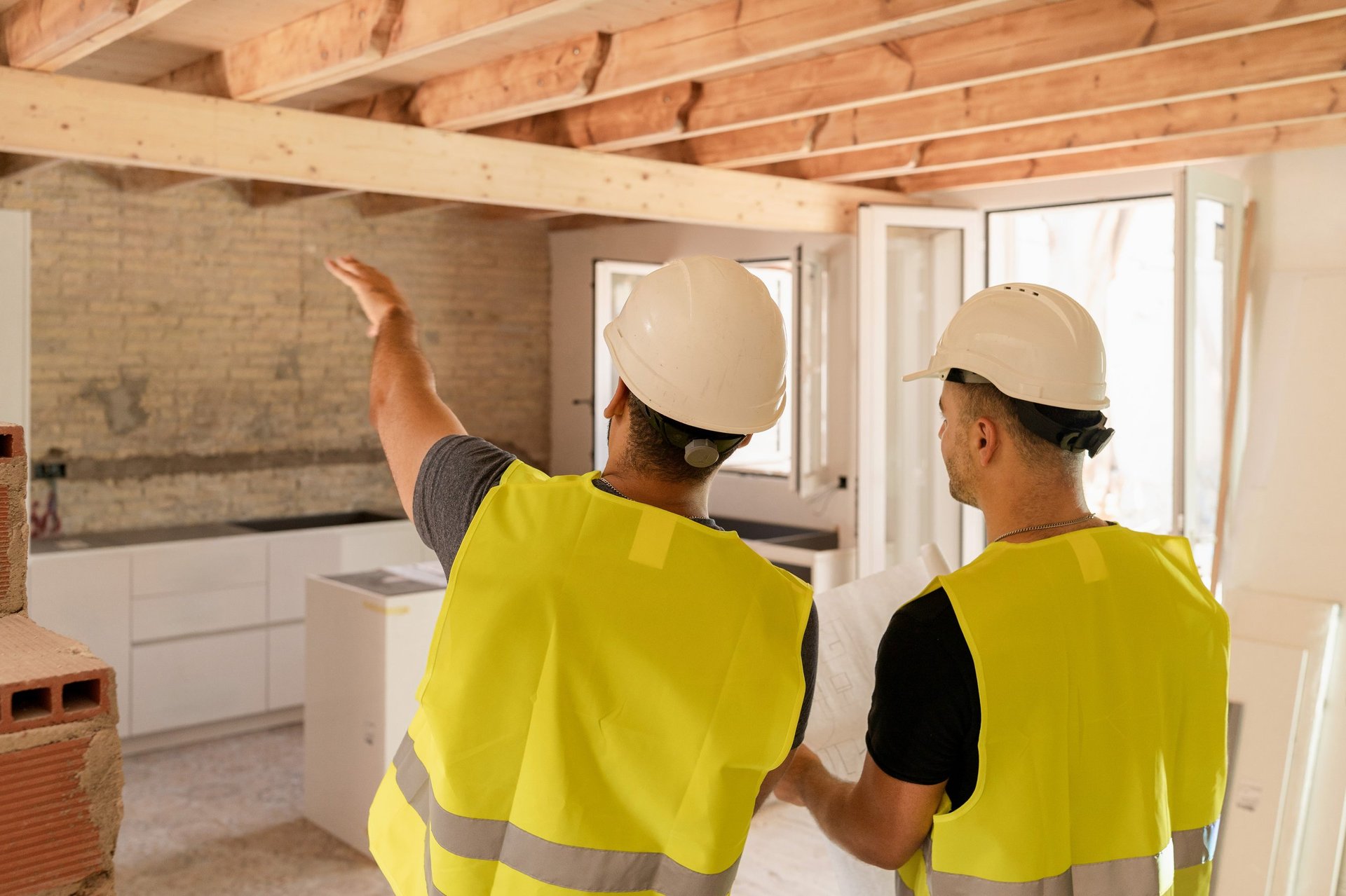 Construction workers renovating a home